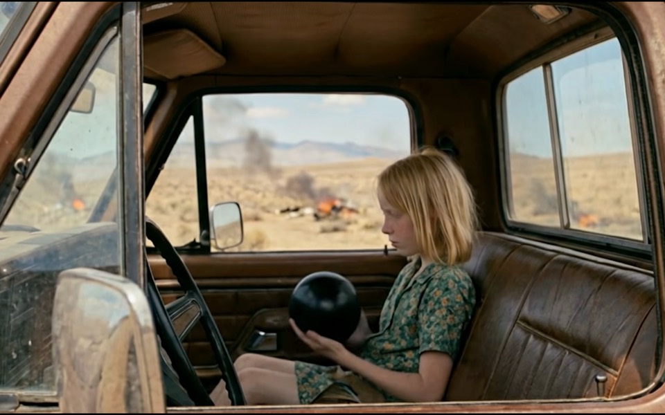 While the crash site burns outside, Susie studies the black sphere she recovered from the wreckage.